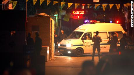 An ambulance enters the Burj Shamali Palestinian refugee camp, in the southern port city of Tyre, Lebanon, Friday, 10 December. 