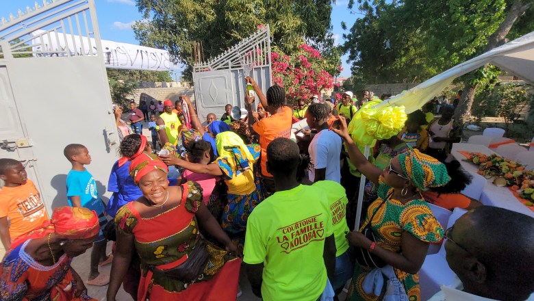 Members and fans of the Gros Moteur rara band in the courtyard of the Souvenance in Gonaïves on April 6, 2025. Photo by Ones Joseph / The Haitian Times.