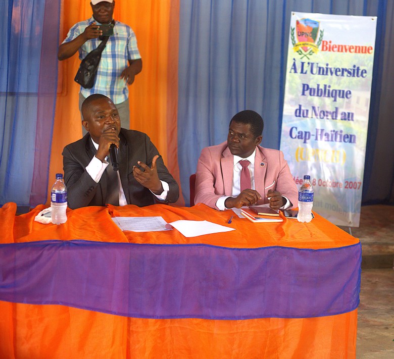 Fort-Liberté’s City Attorney Eno Zephirin speaking next to Judge Aristil Frito during the Patriotic Congress for the National Rescue at the Public University of North of Cap-Haïtien (UPNCH) on June 11, 2025. Photo by Onz Chéry/ The Haitian Times.
