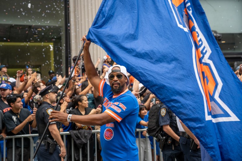 Overjoyed fans at the Knicks Championship Parade on Thursday, June 18, 2026, in Manhattan. Photo by Fredner Cayemitte/The Haitian Times