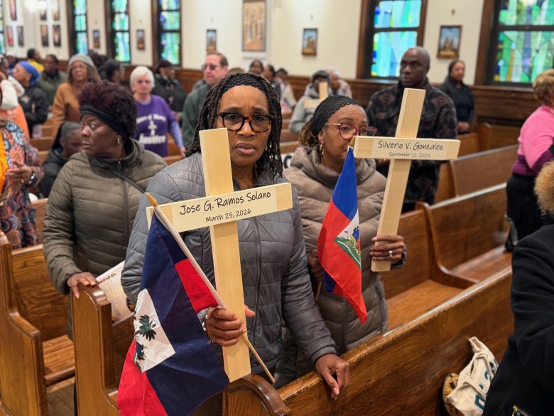 The faithful during a mass that was part of the procession through the streets of Flatbush on Saturday, October 17, 2026.  
