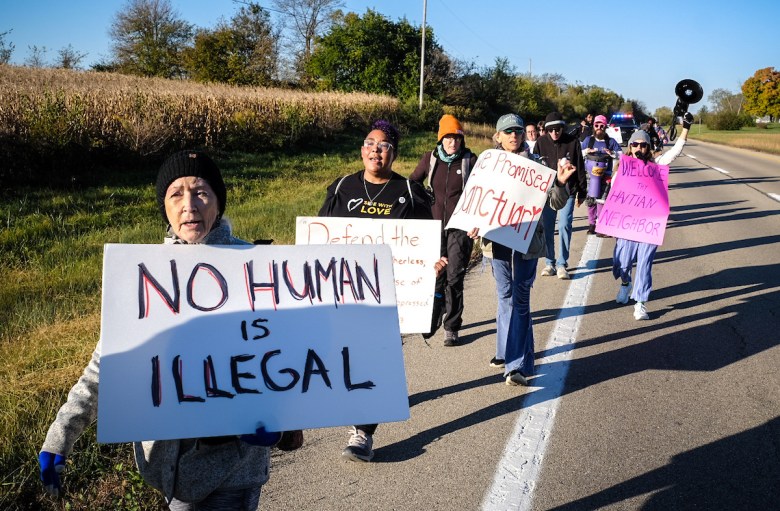 Marchers kick off a 40-mile procession in Springfield, Ohio, demanding an end to ICE tactics harming Haitian families on Wednesday, October 21, 2026.  
