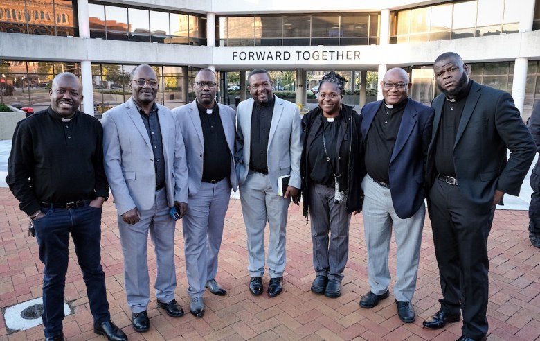 A group of Haitian clergy pose for a photo during the pilgrimage kickoff in Springfield, Ohio, demanding an end to ICE tactics harming Haitian families on Wednesday, October 21, 2026.  
