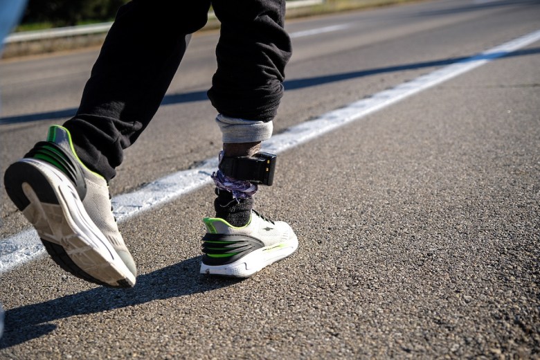 A Haitian immigrant fitted with an ankle monitor was among those in the 40-mile procession in Springfield, Ohio, on Wednesday, October 21, 2026. Photo by Steve Pavey, used with courtesy